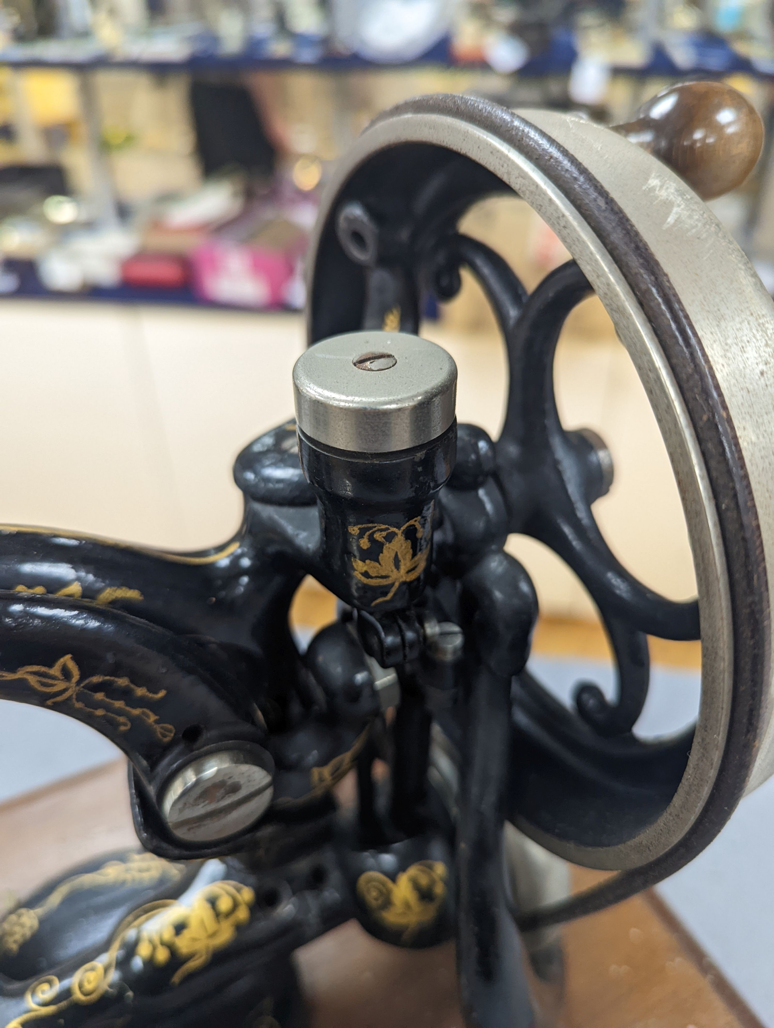 A Victorian sewing machine, Corona typewriter and two microscopes